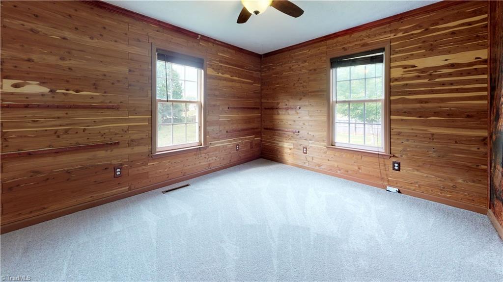 114 Hawksbridge Road Mount Airy, NC 27030 - Photo 16 of 20 Custom cedar like walls that would be great for an outdoor themed bedroom. Or you could always customize it on your own...just paint it white and make it look like shiplap? Whichever you prefer, you can make it your own!