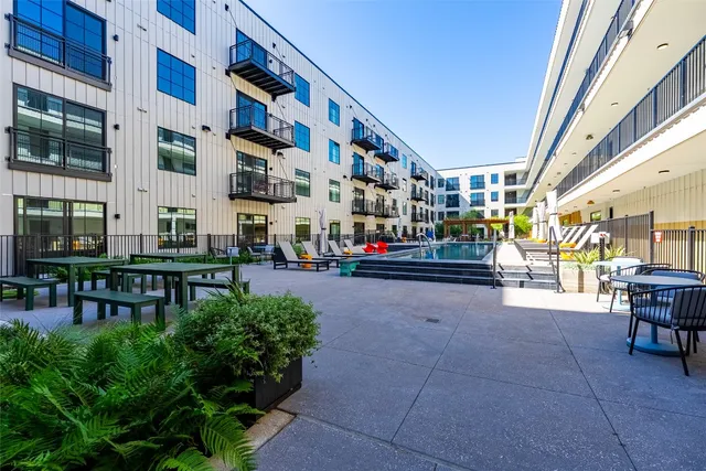 a view of a building with sitting area