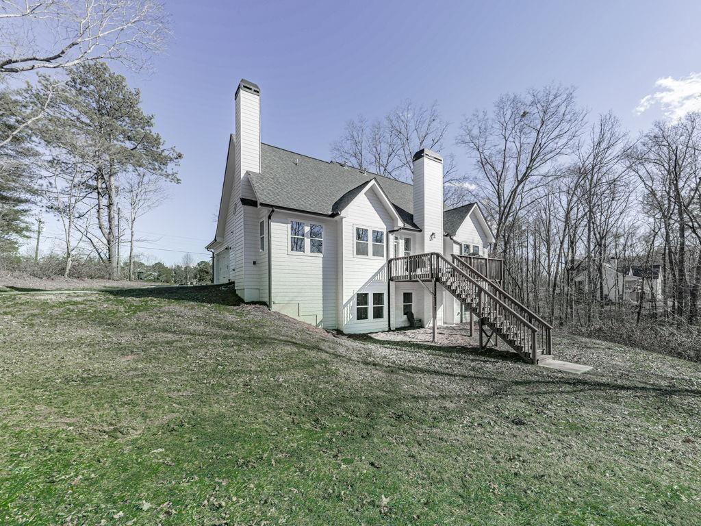 711 Carver Mill Road Talking Rock, GA 30175 - Photo 11 of 39 a view of a house with a yard