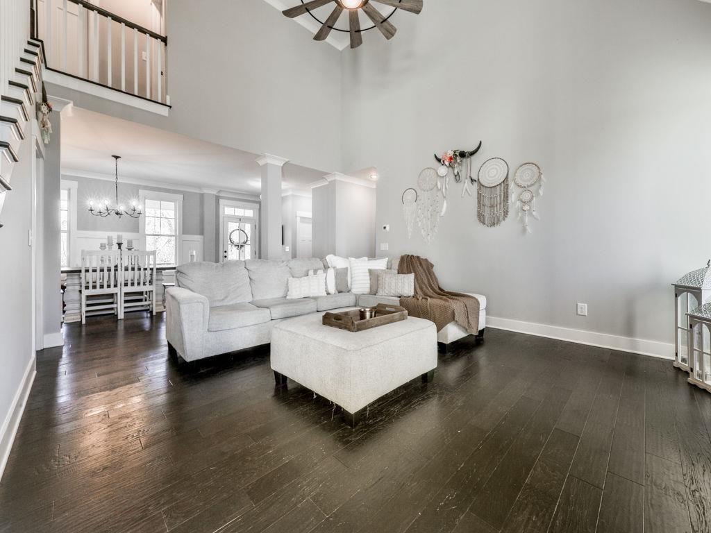 711 Carver Mill Road Talking Rock, GA 30175 - Photo 17 of 39 a living room with furniture and a chandelier