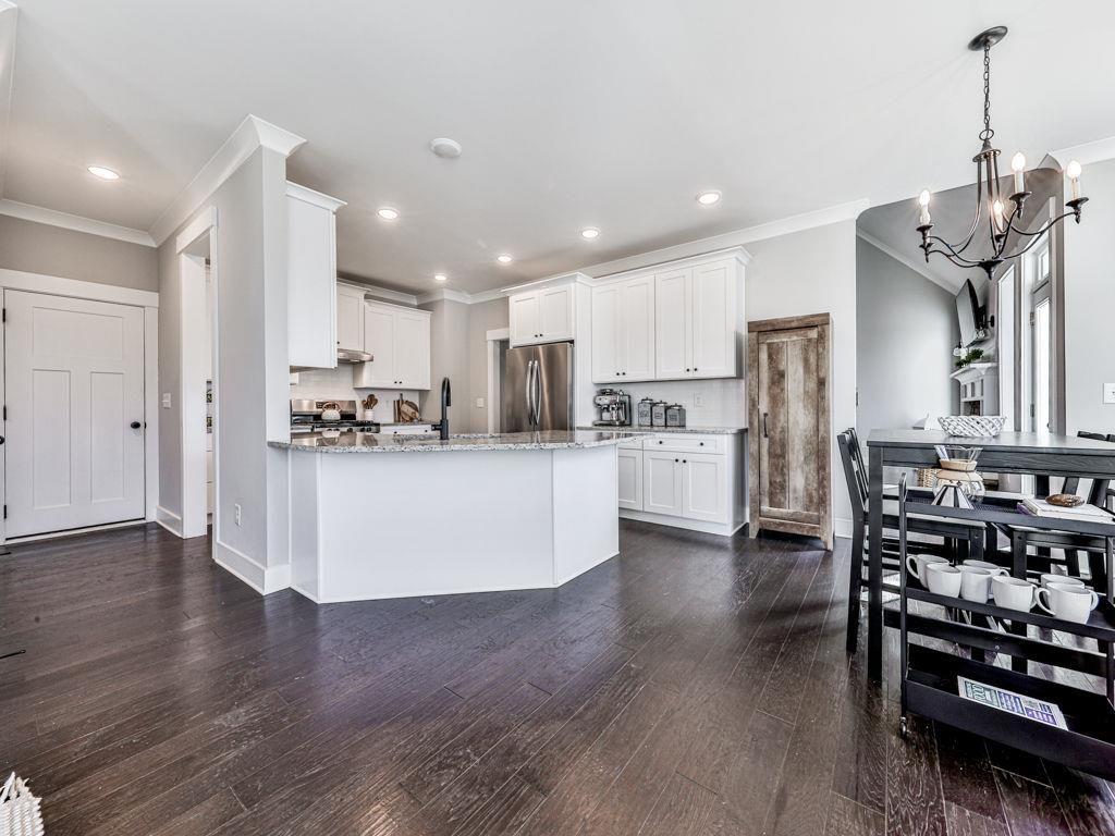 711 Carver Mill Road Talking Rock, GA 30175 - Photo 21 of 39 a view of kitchen with stainless steel appliances refrigerator stove microwave and cabinets