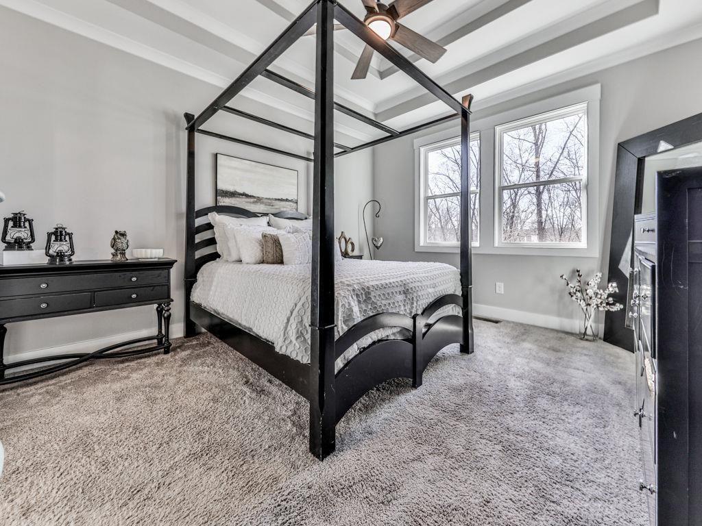 711 Carver Mill Road Talking Rock, GA 30175 - Photo 24 of 39 a bed room with a bed and a tv