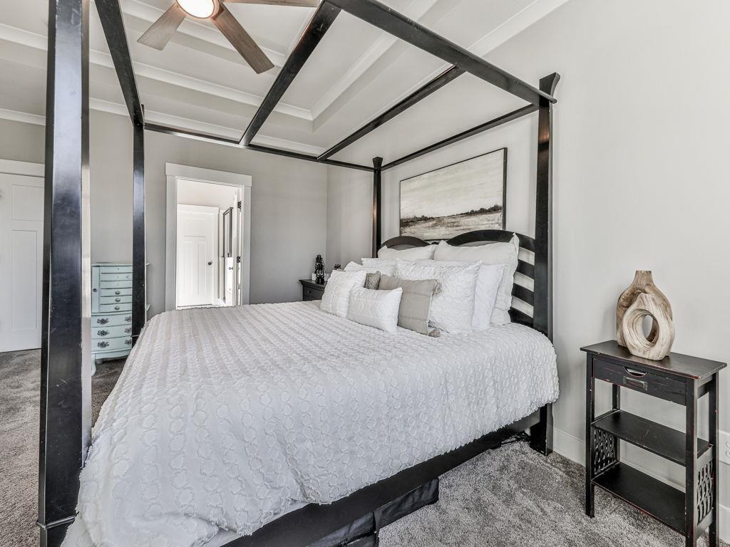 711 Carver Mill Road Talking Rock, GA 30175 - Photo 25 of 39 a bedroom with a bed and a window