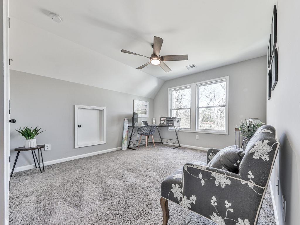 711 Carver Mill Road Talking Rock, GA 30175 - Photo 30 of 39 a living room with furniture and white walls