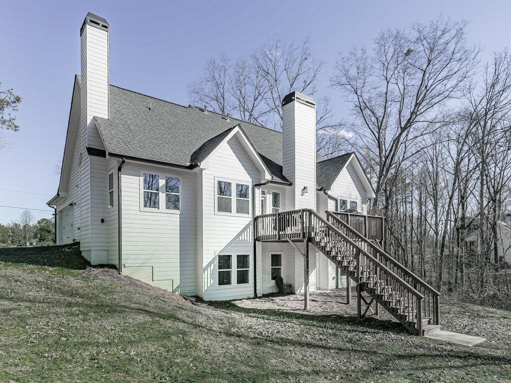 711 Carver Mill Road Talking Rock, GA 30175 - Photo 6 of 39 a view of a house with a yard