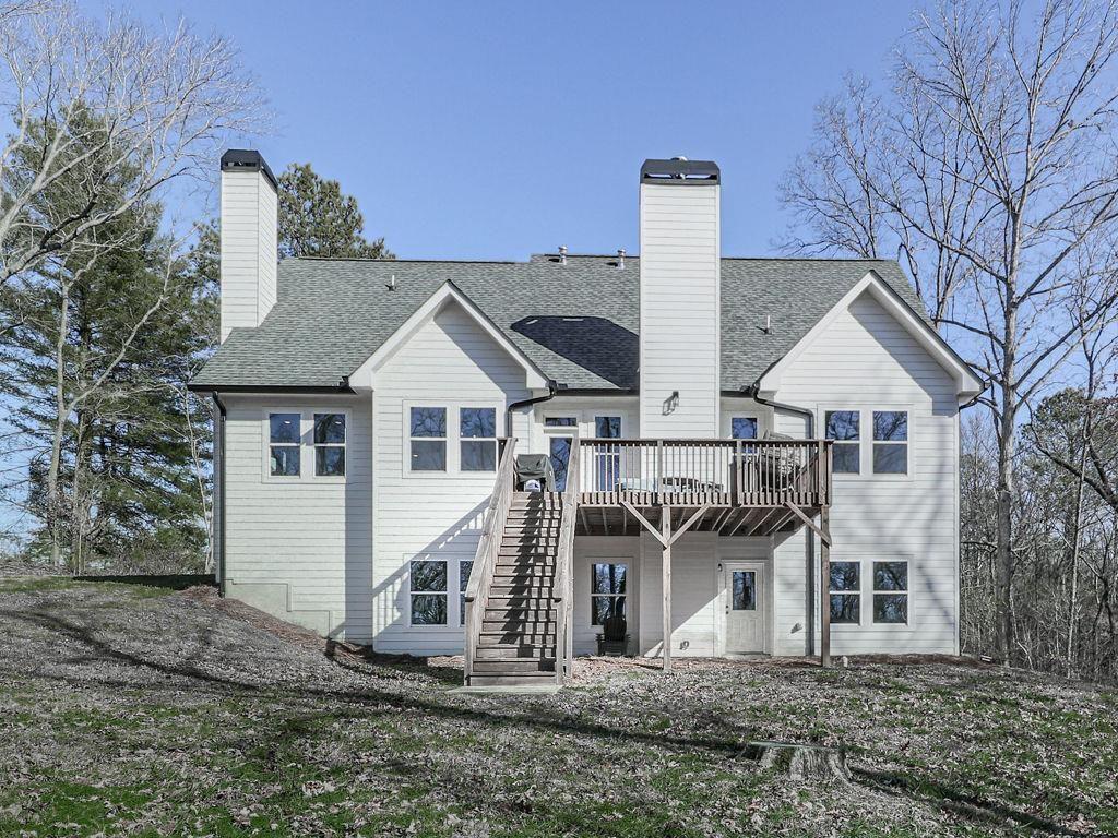 711 Carver Mill Road Talking Rock, GA 30175 - Photo 8 of 39 a view of a house with a yard