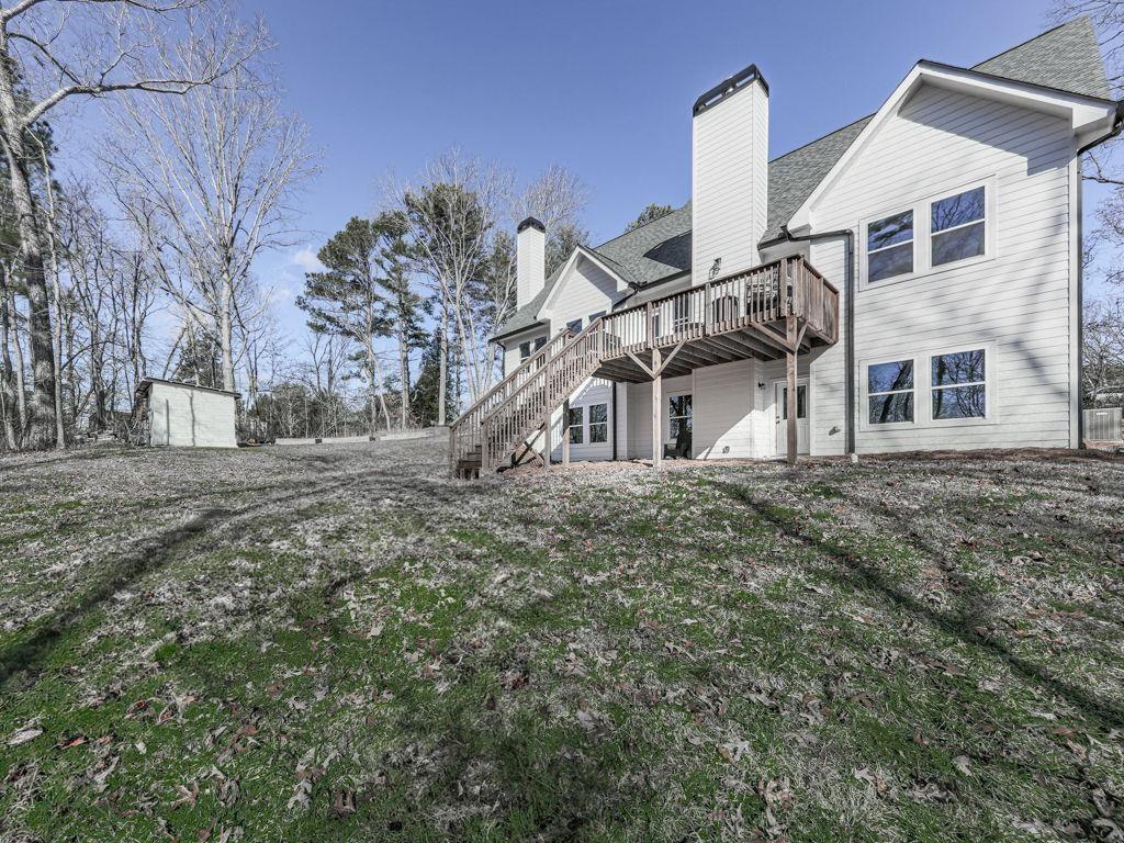 711 Carver Mill Road Talking Rock, GA 30175 - Photo 9 of 39 a view of a house with a yard