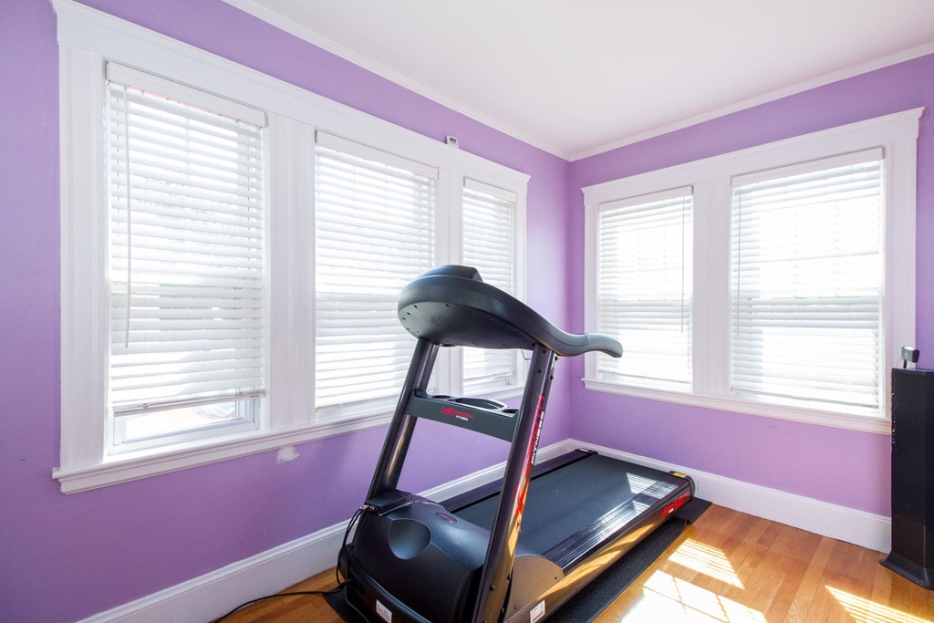 10 Caltha Road Boston, MA 02135 - Photo 7 of 30 a bedroom with a bed windows and a window