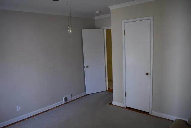a bathroom with a granite countertop sink