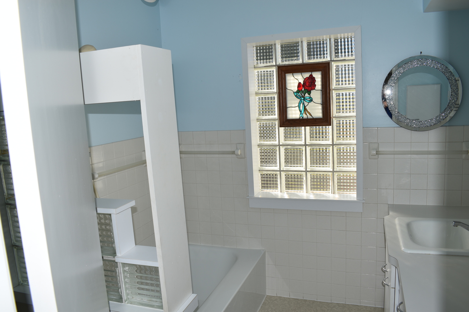 501 South Main Street Flanagan, IL 61740 - Photo 26 of 36 a bathroom with a sink and a mirror