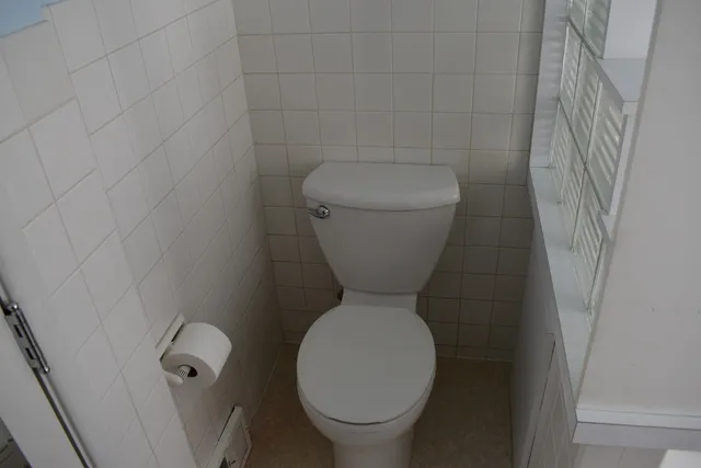 a room with a couch and a window