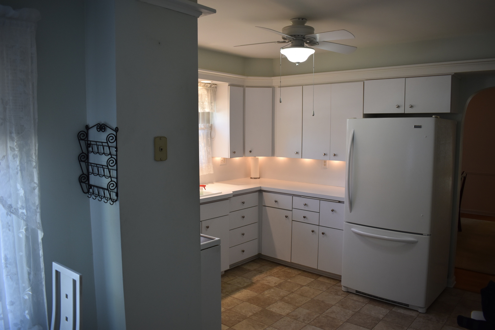 501 South Main Street Flanagan, IL 61740 - Photo 8 of 36 a white refrigerator freezer sitting in a kitchen