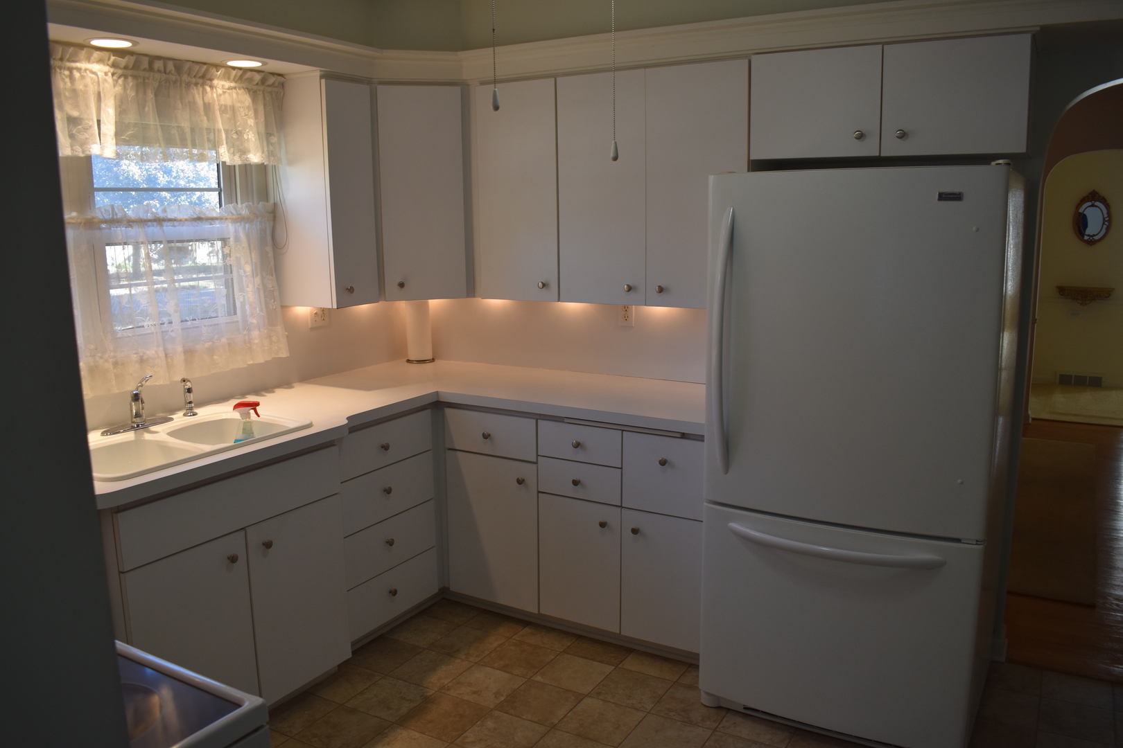 501 South Main Street Flanagan, IL 61740 - Photo 10 of 36 a kitchen with a sink and cabinets