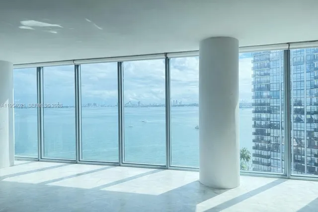 an empty room with sliding door