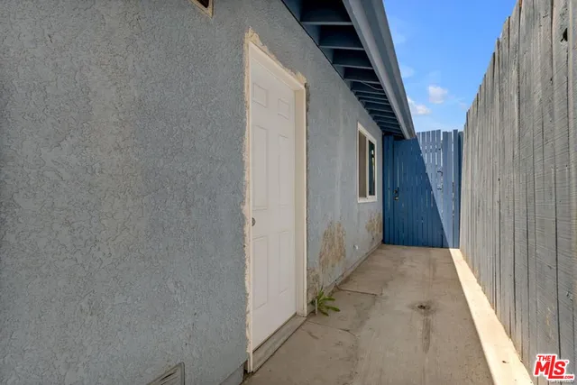 a view of a hallway with entryway