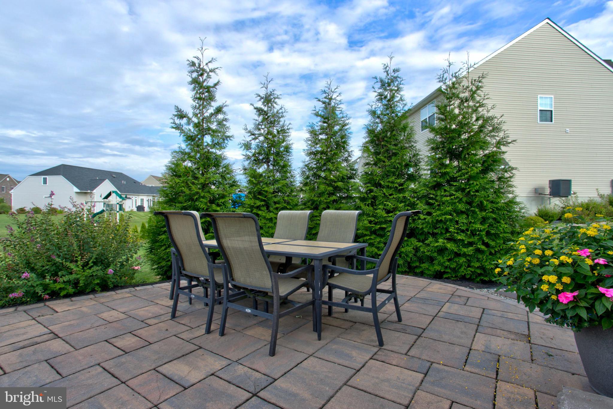 617 Warminster Lane Lititz, PA 17543 - Photo 45 of 56 SIde patio area - nicely landscaped for privacy!