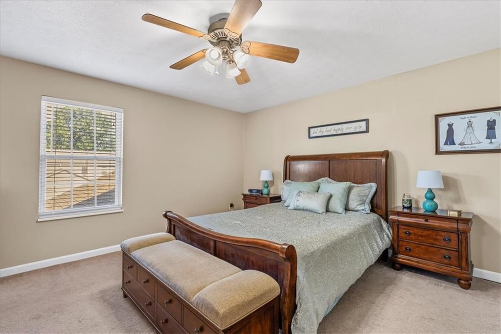 1489 Yorktown Drive Lawrence, PA 15055 - Photo 21 of 37 a bedroom with a bed and a chandelier