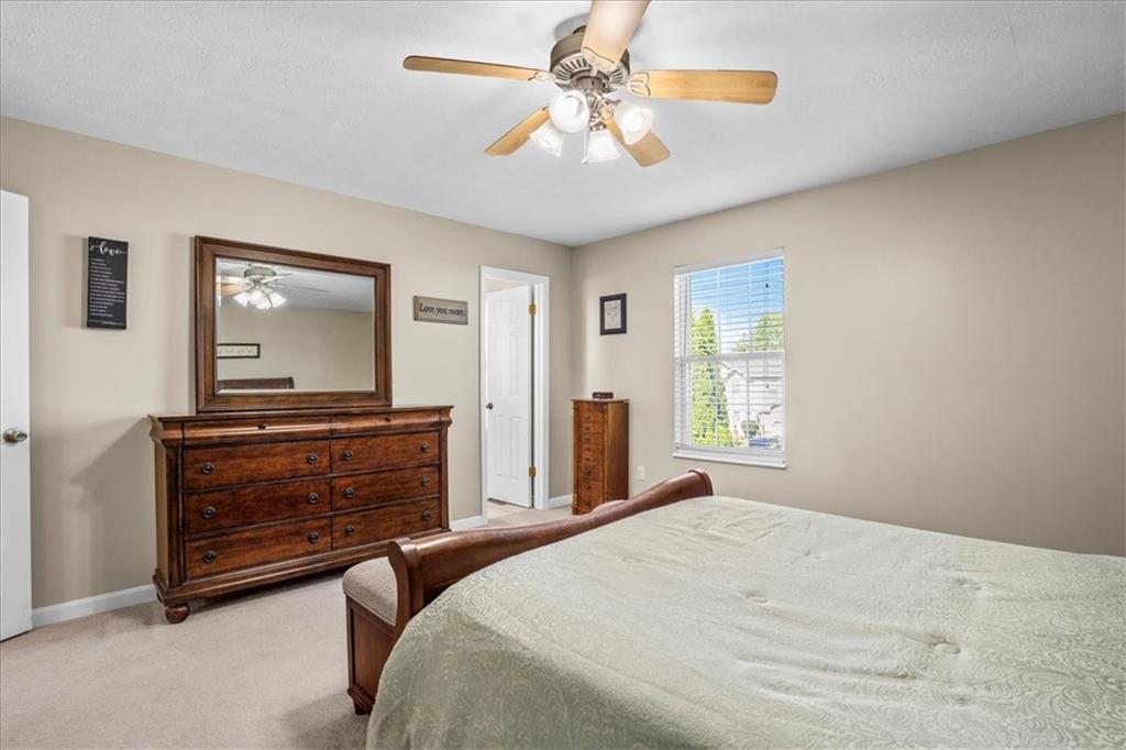 1489 Yorktown Drive Lawrence, PA 15055 - Photo 23 of 37 a bedroom with a bed and a tv on dresser