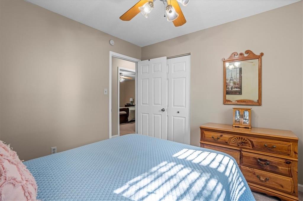 1489 Yorktown Drive Lawrence, PA 15055 - Photo 27 of 37 a bedroom with a bed and a lamp on dresser