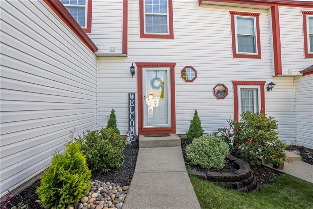1489 Yorktown Drive Lawrence, PA 15055 - Photo 3 of 37 a front view of a house with garden