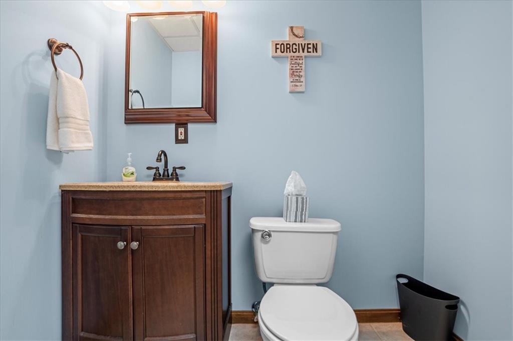 1489 Yorktown Drive Lawrence, PA 15055 - Photo 32 of 37 a bathroom with a toilet a sink and mirror