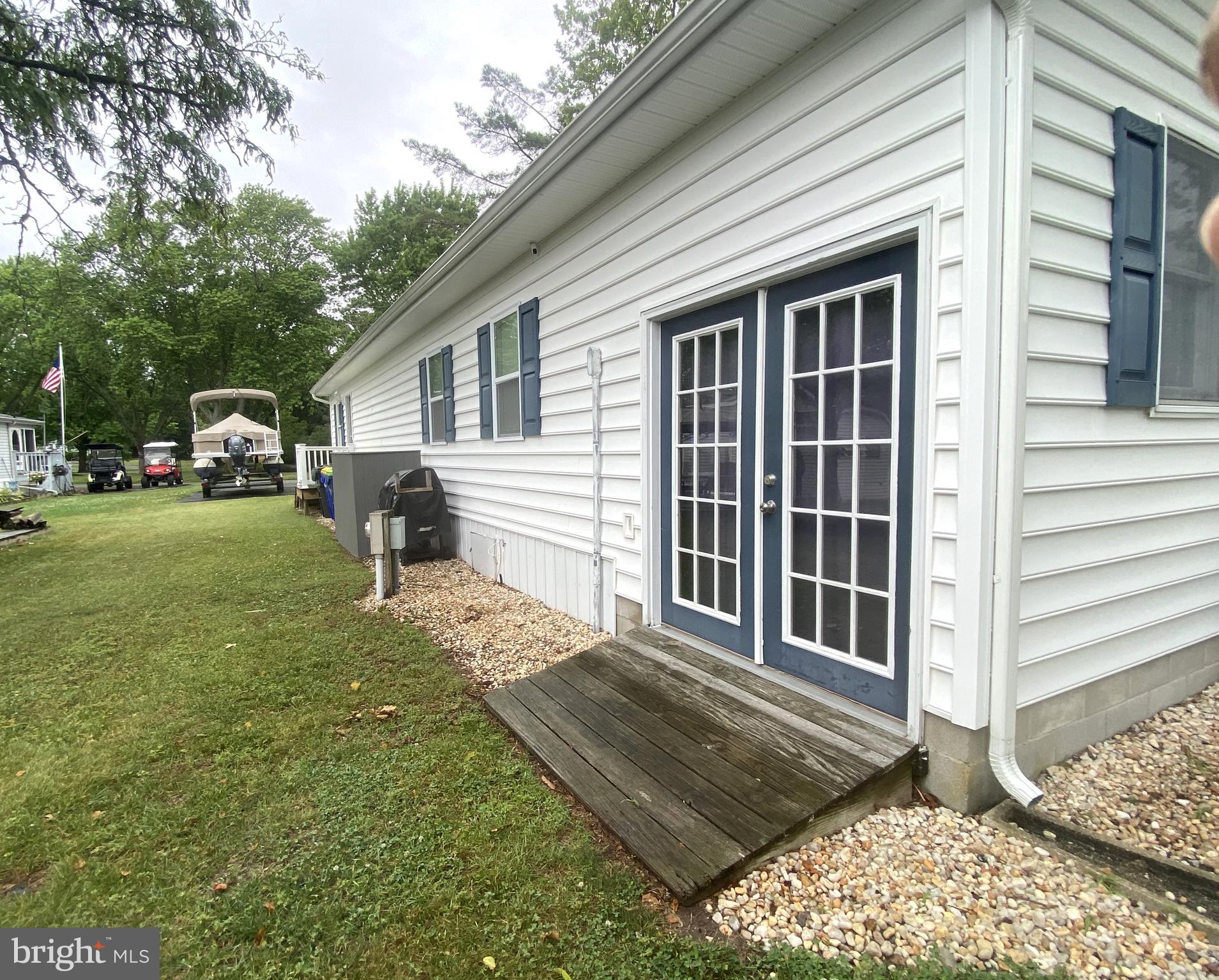 26608 Landing Road, Unit 27 Long Neck, DE 19966 - Photo 24 of 37 Fanciest Shed doors