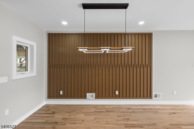 404 Washington Street Perth Amboy, NJ 08861 - Photo 31 of 45 a view of room with a ceiling fan