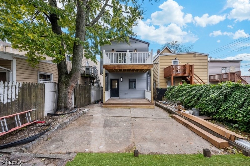 404 Washington Street Perth Amboy, NJ 08861 - Photo 41 of 45 a front view of a house with garden