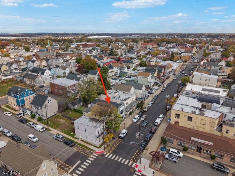 404 Washington Street Perth Amboy, NJ 08861 - Photo 5 of 45 an aerial view of residential houses with outdoor space