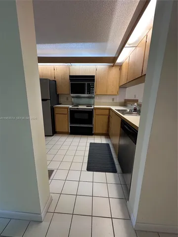 $195,000 | 2811 Village Boulevard, Unit 404, West Palm Beach, FL 33409