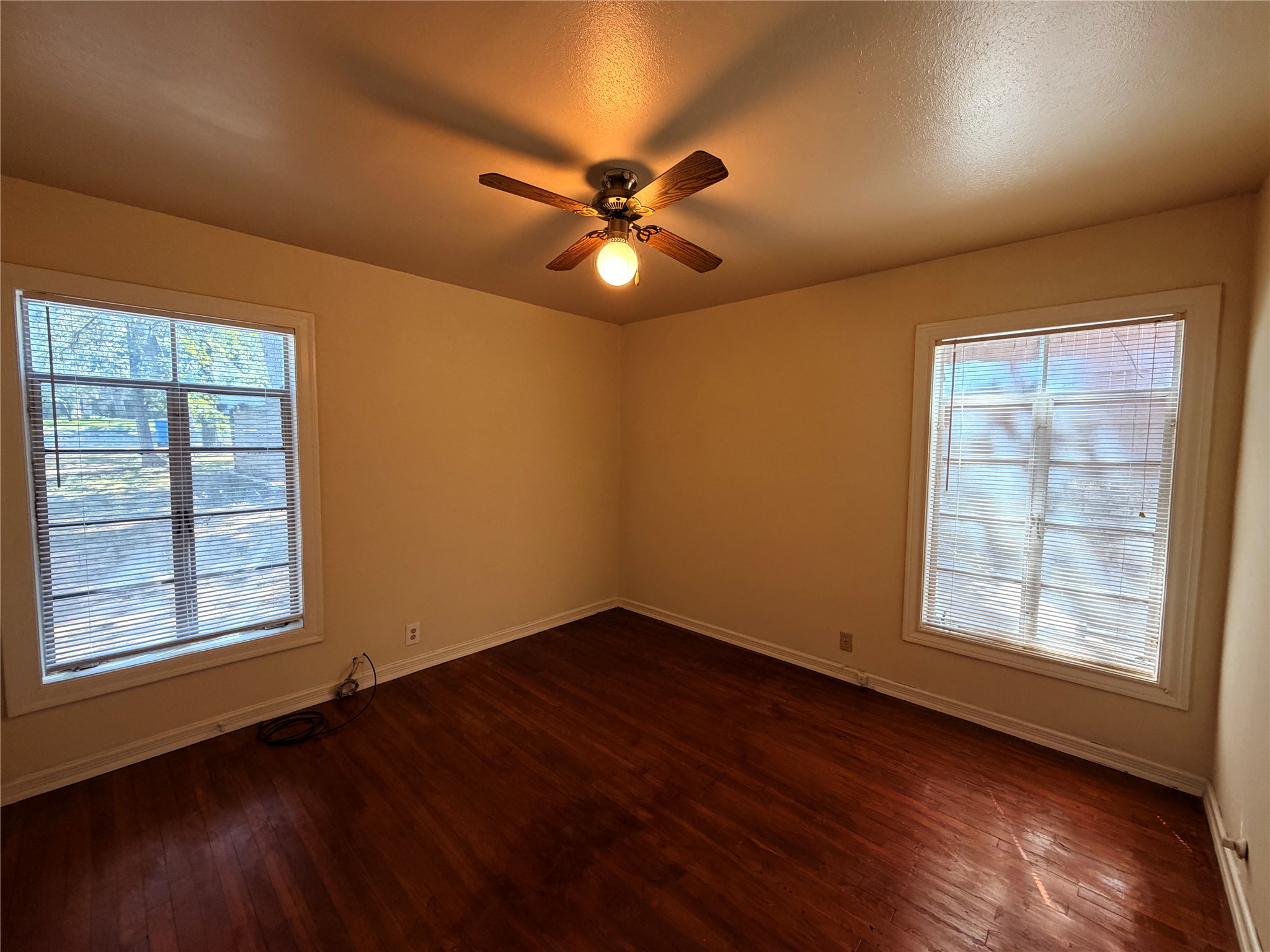 2509 Enfield Road, Unit A Austin, TX 78703 - Photo 6 of 6 Rich hardwood floors create a welcoming atmosphere in this tranquil room.
