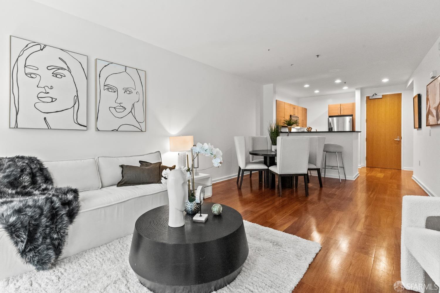 200 2nd Street, Unit 103 Oakland, CA 94607 - Photo 24 of 31 a living room with furniture and a large window