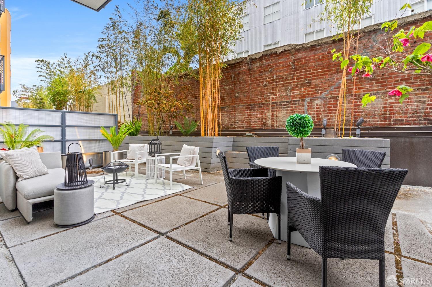 200 2nd Street, Unit 103 Oakland, CA 94607 - Photo 27 of 31 a outdoor space with patio furniture and potted plants