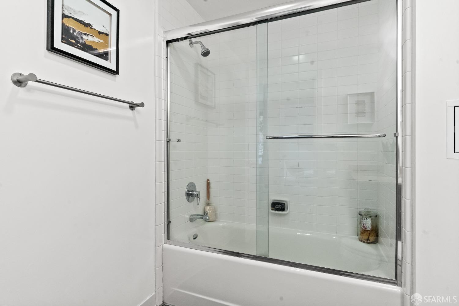 200 2nd Street, Unit 103 Oakland, CA 94607 - Photo 6 of 31 a bathroom with a bathtub and a shower