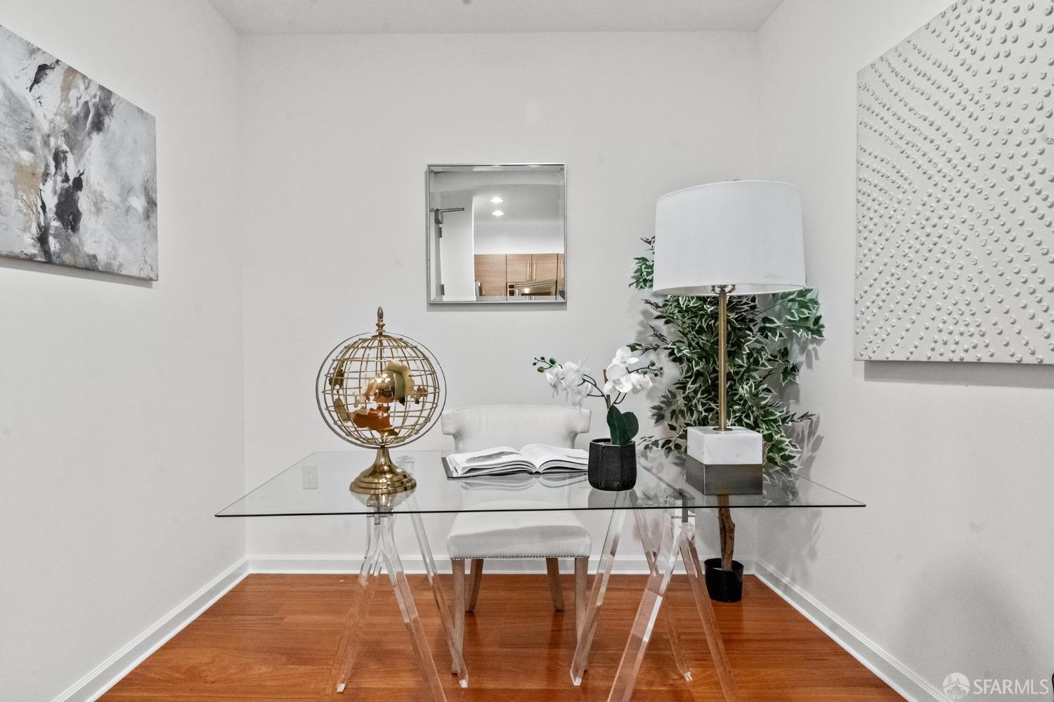 200 2nd Street, Unit 103 Oakland, CA 94607 - Photo 8 of 31 a view of dining room with furniture and wooden floor