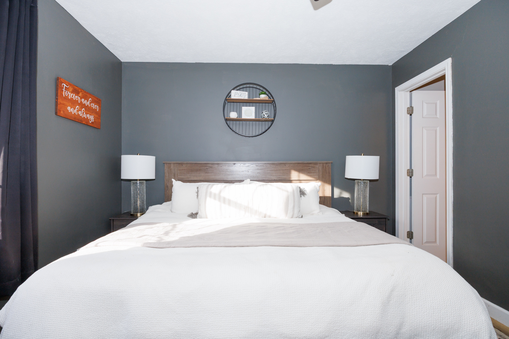 303 South Madison Street Towanda, IL 61776 - Photo 19 of 48 a bedroom with a bed and a lamp