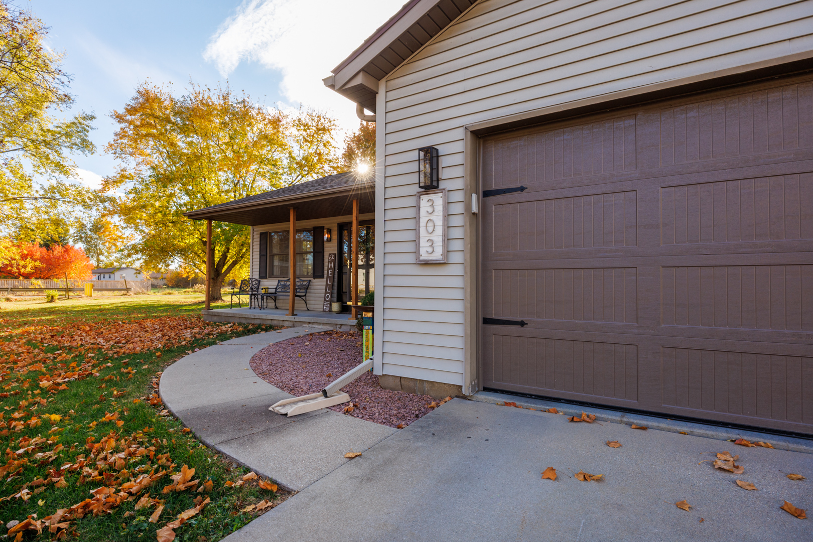 303 South Madison Street Towanda, IL 61776 - Photo 2 of 48 a view of a house with backyard