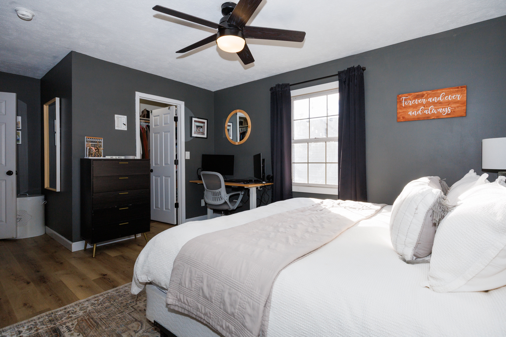 303 South Madison Street Towanda, IL 61776 - Photo 21 of 48 a bedroom with a bed and a chandelier