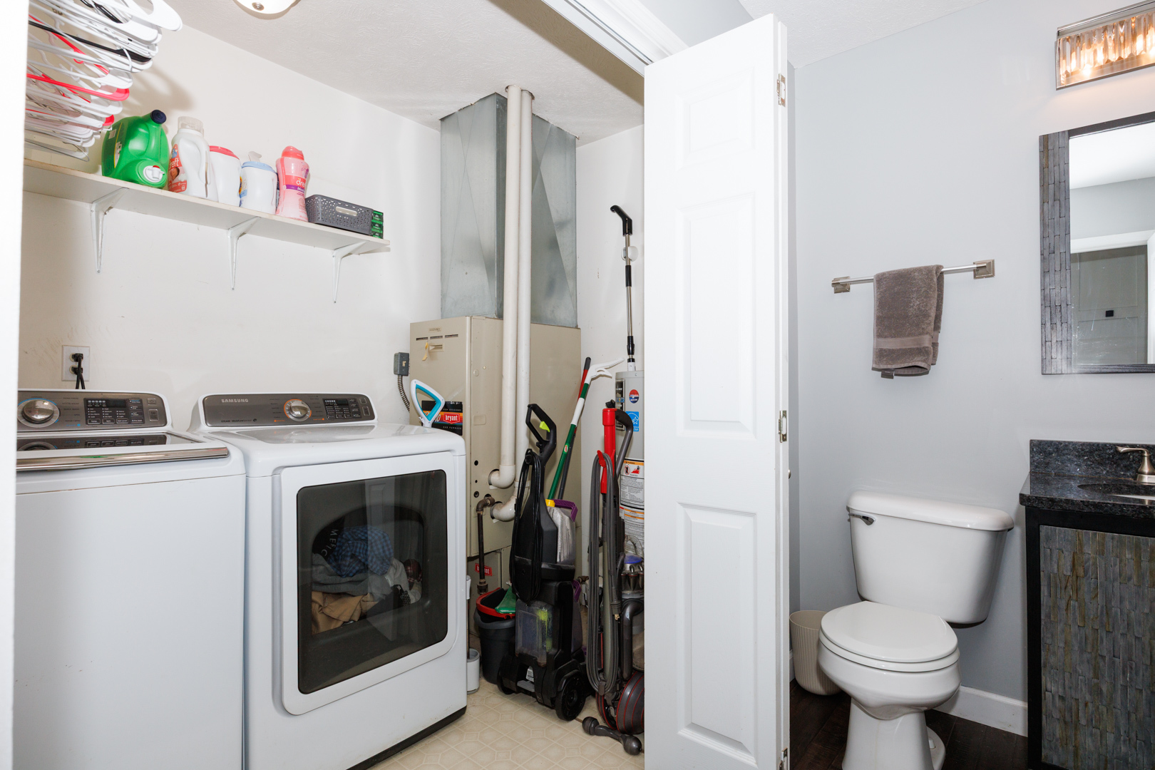 303 South Madison Street Towanda, IL 61776 - Photo 24 of 48 a bathroom with a toilet and a sink