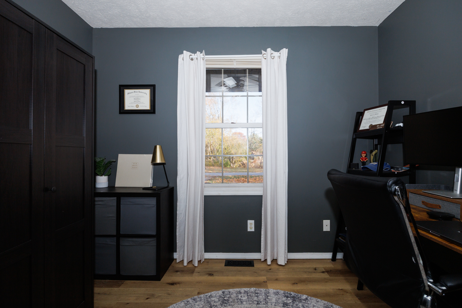 303 South Madison Street Towanda, IL 61776 - Photo 28 of 48 a view of room with wooden floor closet and windows
