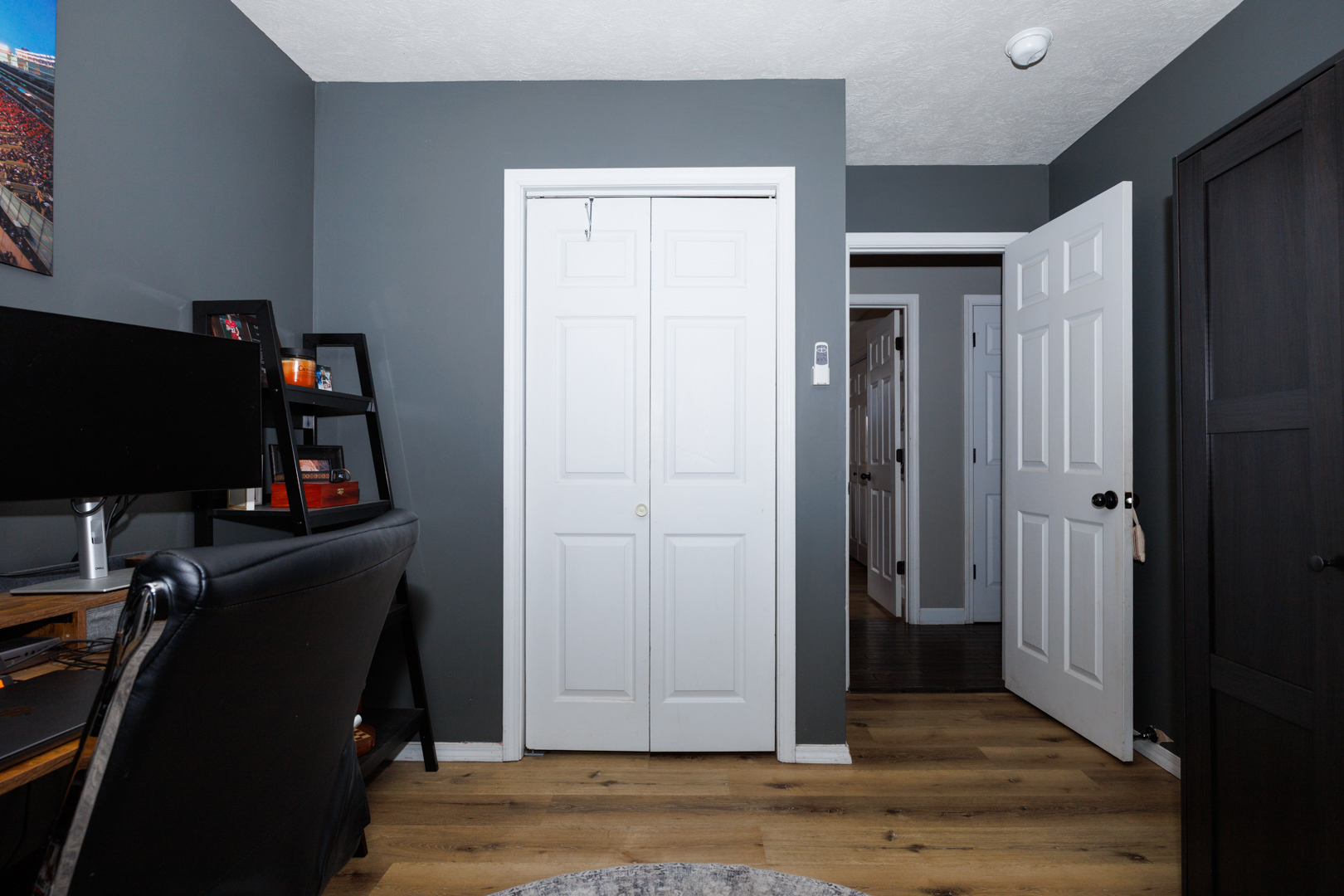 303 South Madison Street Towanda, IL 61776 - Photo 29 of 48 an empty room with wooden floor and closet