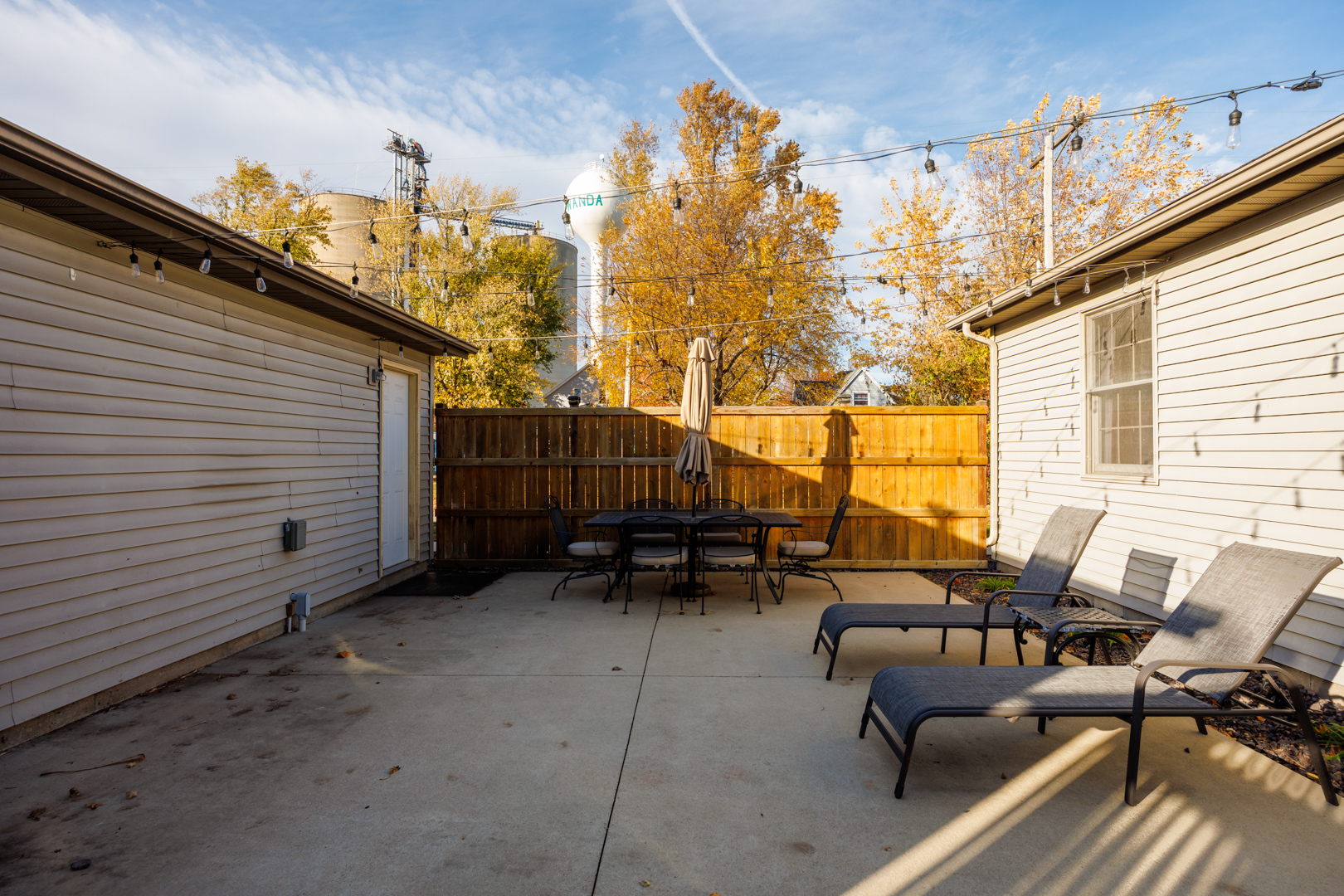 303 South Madison Street Towanda, IL 61776 - Photo 31 of 48 a backyard of a house with outdoor seating