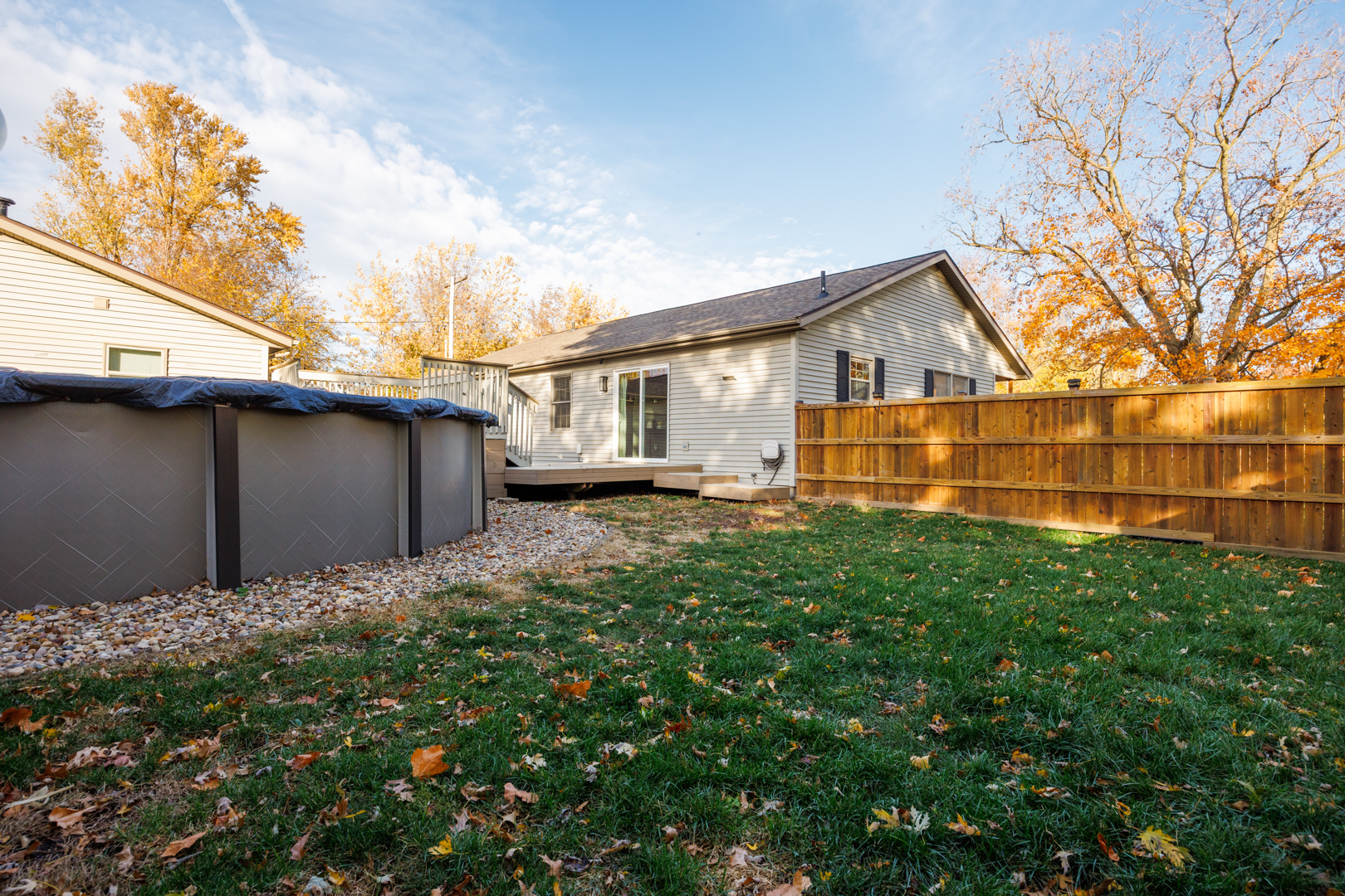 303 South Madison Street Towanda, IL 61776 - Photo 34 of 48 a backyard of a house with lots of green space