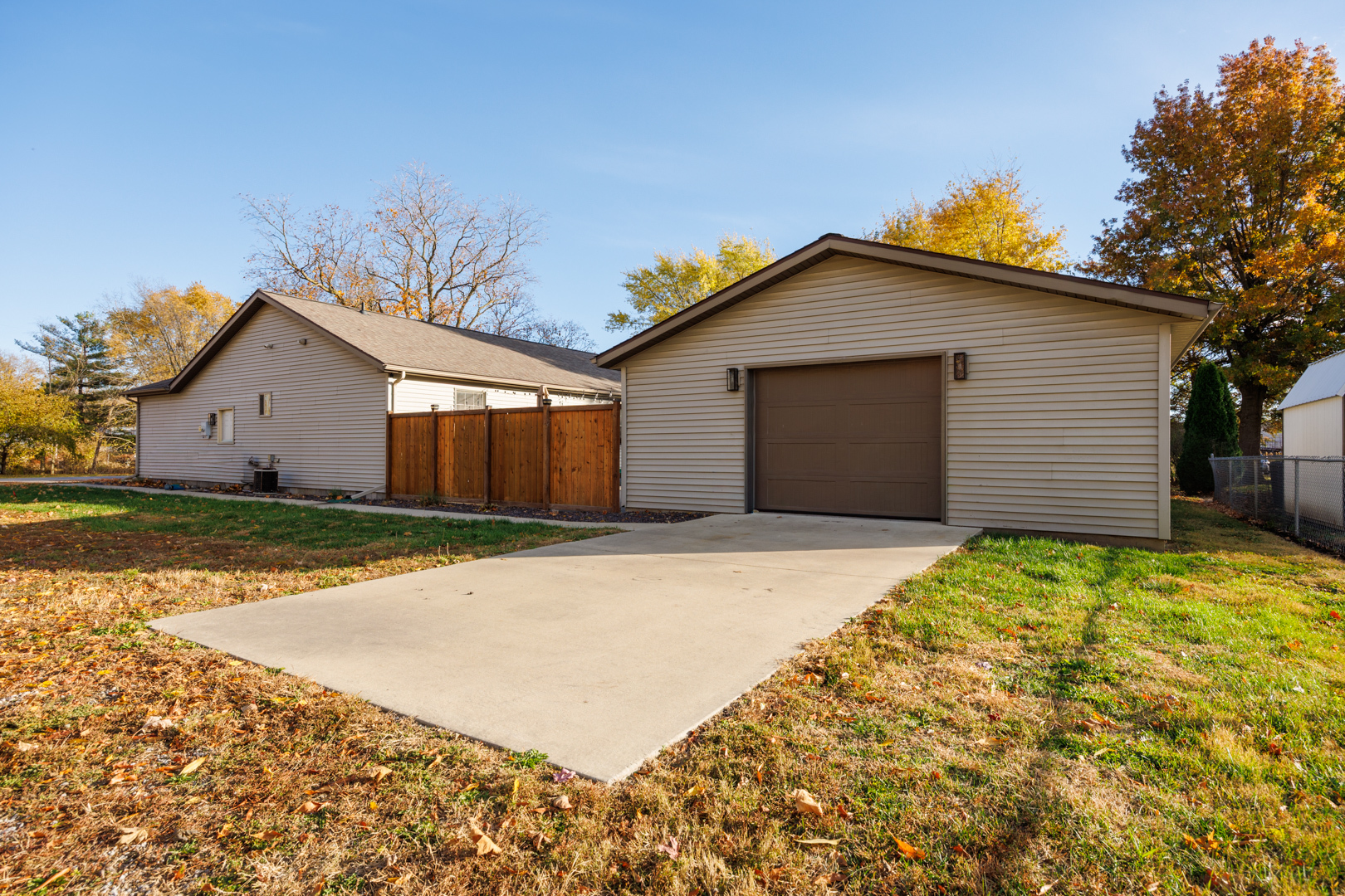 303 South Madison Street Towanda, IL 61776 - Photo 41 of 48 a front view of a house with a yard