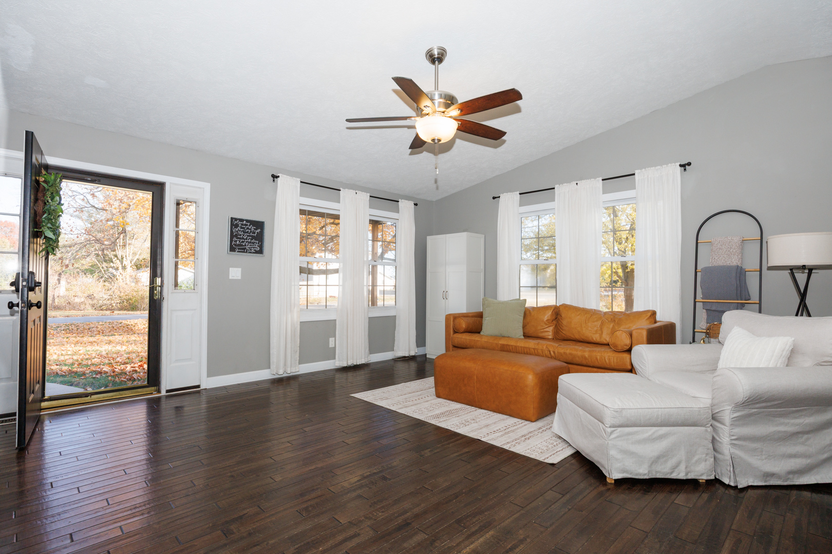 303 South Madison Street Towanda, IL 61776 - Photo 6 of 48 a living room with furniture and a large window