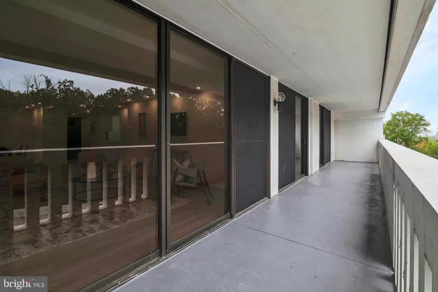 a room with furniture and a chandelier
