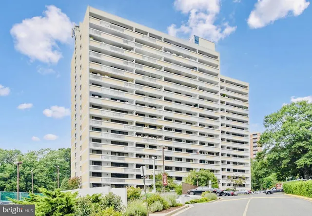 a front view of a building with street view