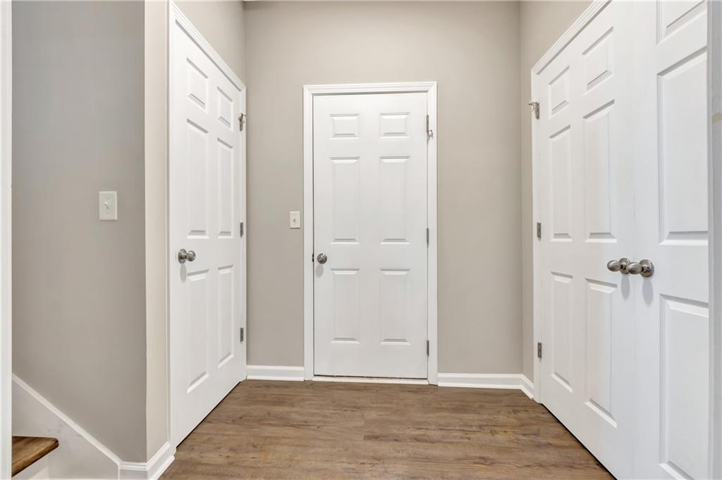 68 Skyview Road Senoia, GA 30276 - Photo 29 of 51 a view of a hallway with wooden floor and a shower