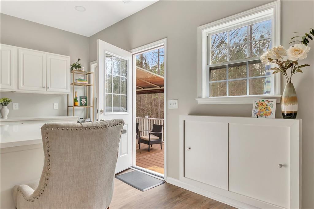 68 Skyview Road Senoia, GA 30276 - Photo 37 of 51 a kitchen with granite countertop cabinets and window