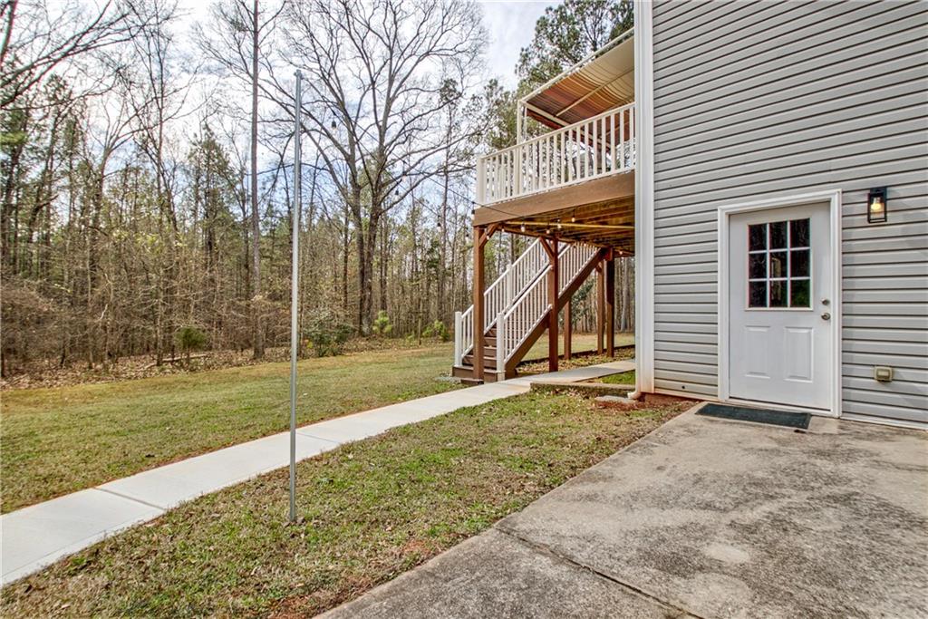 68 Skyview Road Senoia, GA 30276 - Photo 39 of 51 a view of a house with backyard and trees
